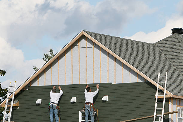 Professional Vinyl Siding technician working in Galena, IL